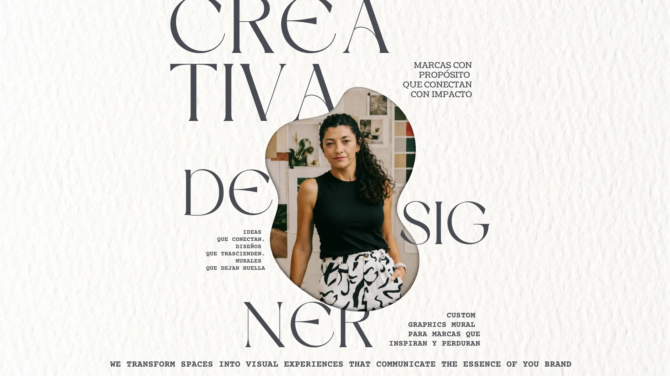 A designer developing KOOLPRINTING GROUP visual-brand concepts at a studio workspace